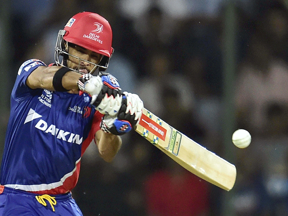 up and over: Daredevils' J&#8200;P Duminy blasts one to the fence en route his unbeaten 78. PTI
