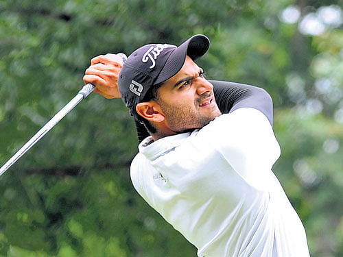 on target Bengaluru's Abhijit Singh Chadha watches his shot on the second day of the Louis Philippe Cup at the  KGA&#8200;course on Friday. DH PHOTO