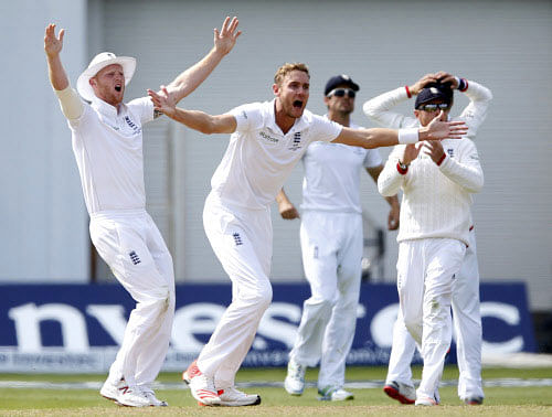 England's Stuart Broad appeals for the wicket of Australia's Peter Nevill. Reuters Image