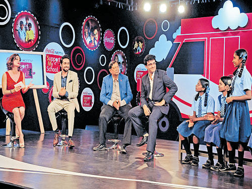 Actors Dia Mirza, Ayushman Khurana, Hindustan Coca-Cola Beverages Chief Executive Officer T Krishnakumar and former Indian Cricket caption Sourav Ganguly interact with schoolchildren at 'SupportMySchool' programmeorganised by Coca-Cola India and NDTV in association with UN Habitat, Charities Aid Foundation in the City on Friday. DH PHOTO