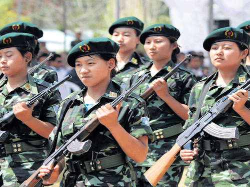 The women armed cadres of NSCN (IM) rehearse for the Naga Independence Day in full uniform. CAISII MAO