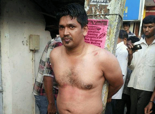 Shakir was stripped and tied to an electricity pole before being beaten up. Photo courtesy: Twitter