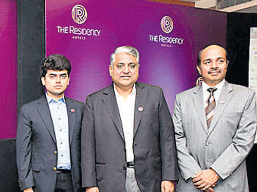 From left Director Rohit Ravi, MD Ravi Appaswamy and COO Gopinath, of The Residency Hotels.