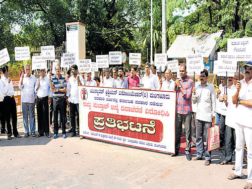 Scholar Robert Rozario addresses a protest rally organised by United Christian Association condemning, Tipu Sultan's birth anniversary celebrations, in front of the Deputy Commissioner's office in Mangaluru on Friday. Dh photo