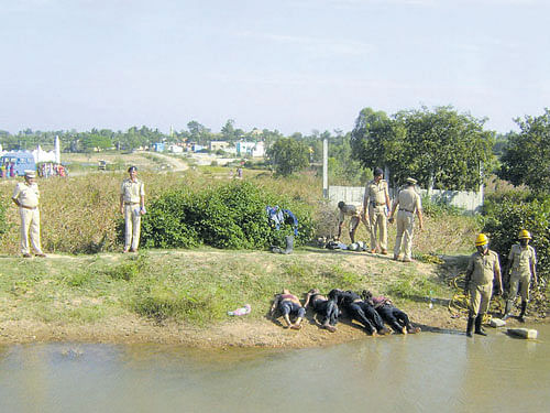The bodies of the four boys who drowned in the Kambampalli tank. DH photo