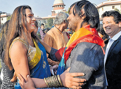 REVIVED HOPE: Activists celebrate outside the Supreme Court in New Delhi on Tuesday after it agreed to hear the petition on Section 377 which makes gay sex a criminal offence. PTI