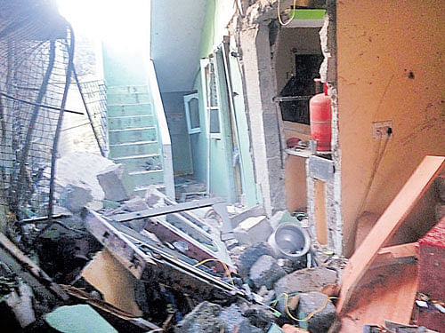 The house in Hebbagodi, which was damaged after an LPG cylinder exploded on Sunday, killing one and injuring four members of a family. DH&#8200;PhOTO