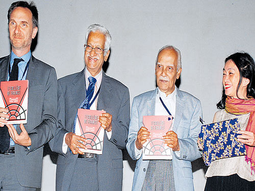 Francois Gautier, Consul General of France, Prof V S Ramamurthy, former director of NIAS, Prof H Sharat Chandra, Honorary Director, Centre for Human Genetics, and  Prof Anne Cheng, Chair of Chinese Intellectual History, College de France, Paris, release the book, 'Le College de France, Five Centuries of Research'  in the City on Wednesday. dh photo