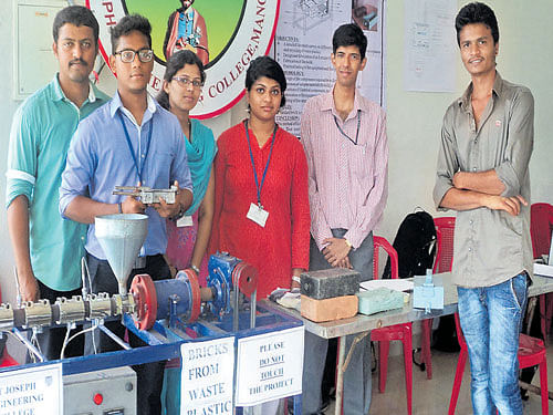 Students of St Joseph's Engineering College display their project as part of National Science Day at Dr Shivarama Karanth Pilikula Nisargadhama on Sunday. Dh photo