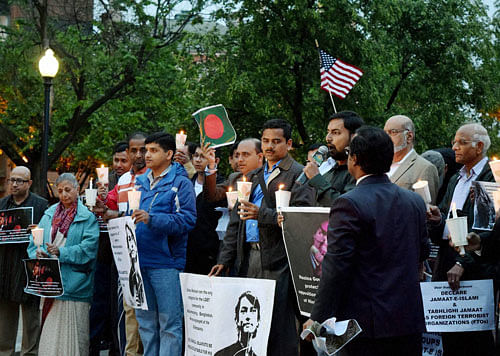 People taking part in a candlelight march in the memory of bloggers, intellectuals and members of minority communities killed in Bangladesh, at the historic Dupont Circle in Washington DC. PTI file Photo