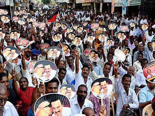 DMK supporters during their party's Chief M Karunanidhi's final day election campaign for Assembly polls at Chepauk constituency in Chennai on Saturday. PTI Photo
