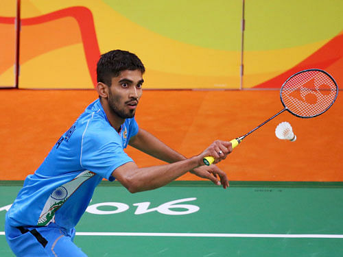 Srikanth Kidambi (IND) of India plays against Lino Munoz (MEX) of Mexico. REUTERS