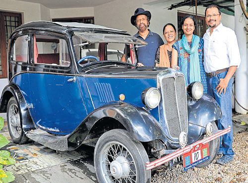 GRAND (From left) P J Joseph, Philomina, Mary Francis and Clifford P Joseph with the 1937 Morris 8.