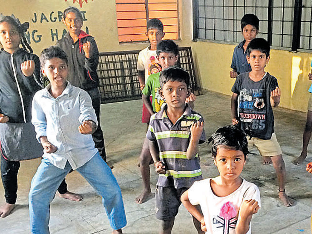 A Taekwondo session in progress for slum children at a community centre in Malleswaram.