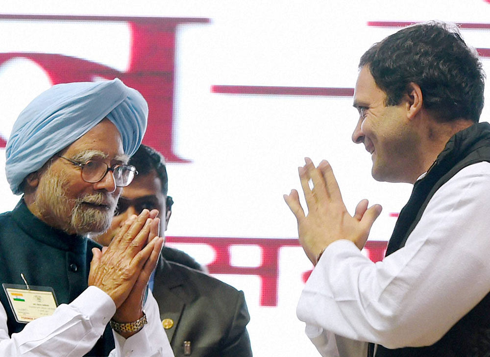 Congress Vice President Rahul Gandhi with former Prime Minister Manmohan Singh at the party's Jan Vedna Sammelan at Talkatora Stadium in New Delhi on Wednesday. PTI Photo