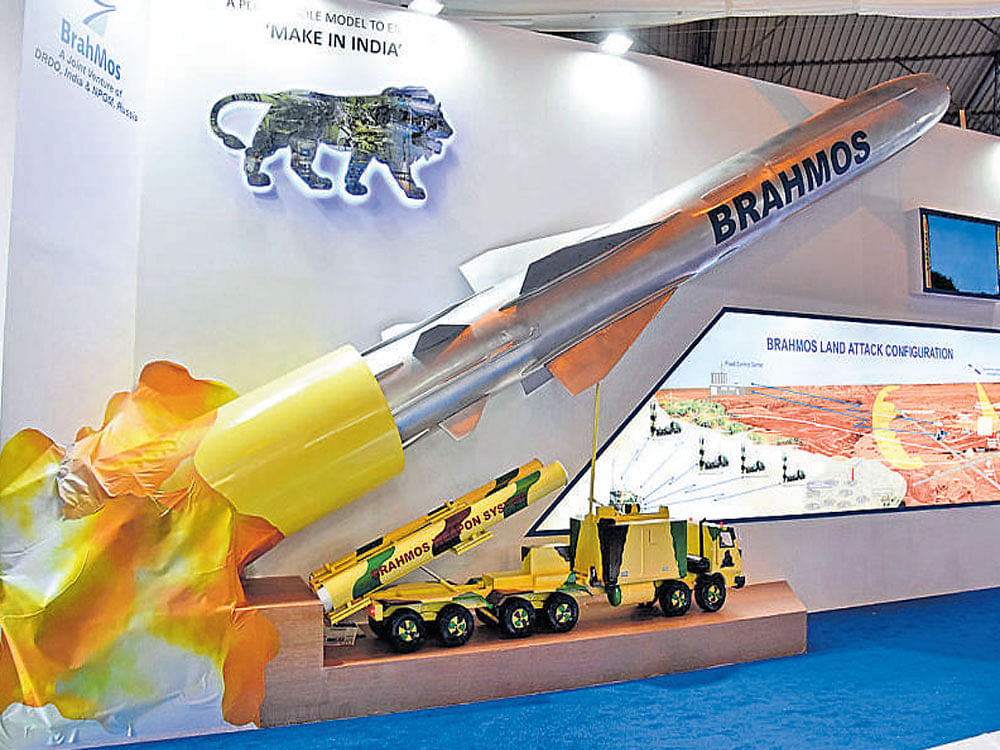 A stall at Aero India displays a model of the BrahMos cruise missile. dh photo