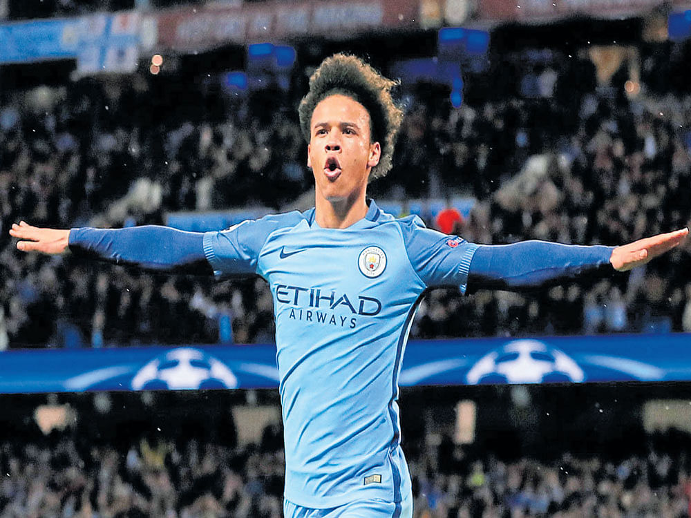 FLYING HIGH: Manchester City's Leroy Sane celebrates after scoring his side's fifth goal against Monaco on Tuesday. REUTERS