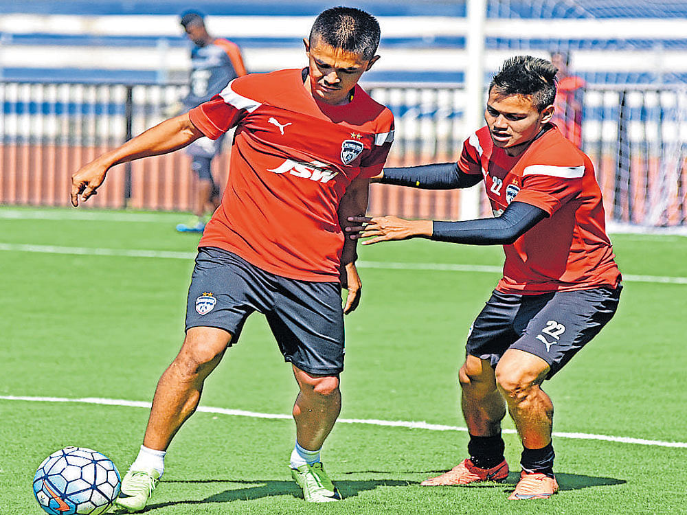 Gearing up: Bengaluru FC's Sunil Chhetri (left) and Nishu Kumar during a traning session on the eve of their I-League tie against East Bengal on Friday. DH Photo/ SK Dinesh