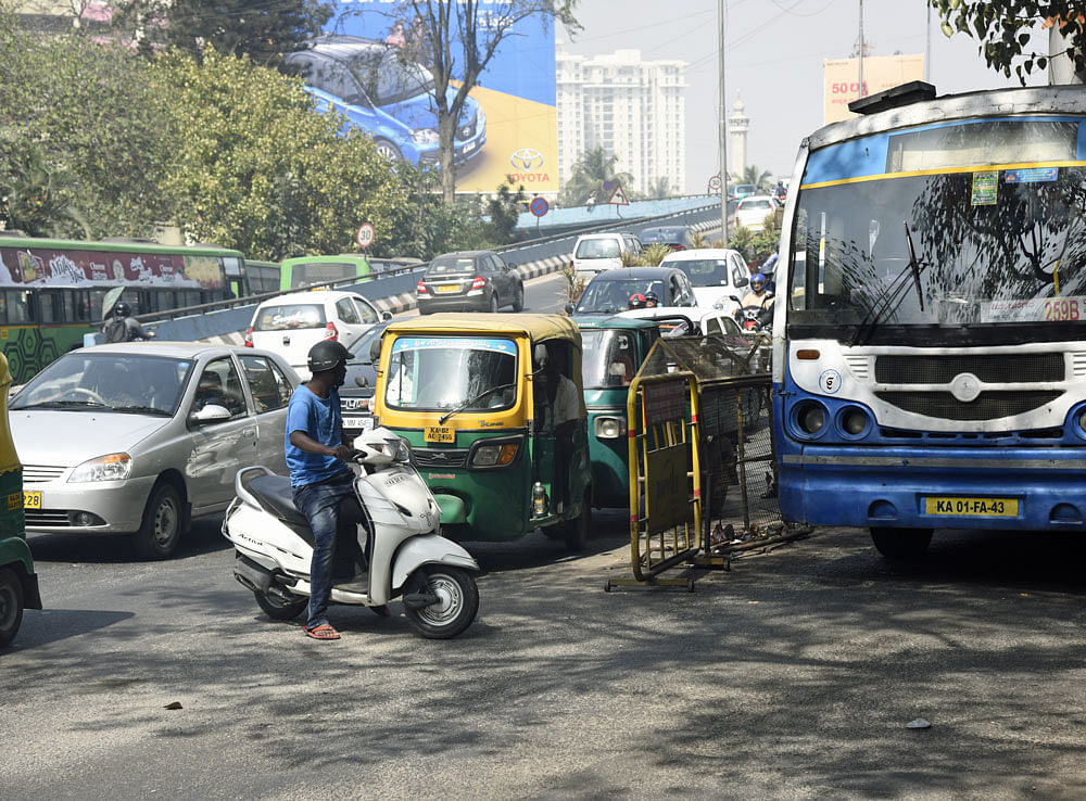 Flouting rules: Sudden U-turns have been causing traffic jams and putting motorists at risk. A&#8200;two-wheeler disrupting the flow of vehicles near Yeshwantpur flyover.