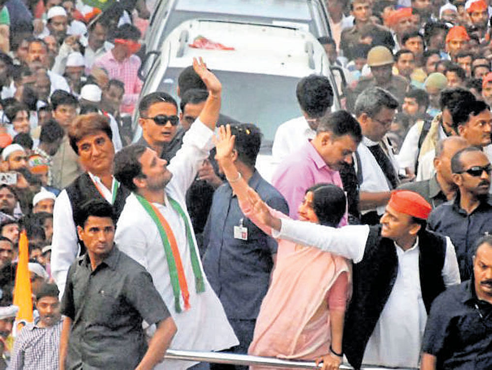 Uttar Pradesh  Congress chief Raj Babbar, party vice president Rahul Gandhi, Chief Minister Akhilesh Yadav and wife Dimple take part in a roadshow. PTI Photo