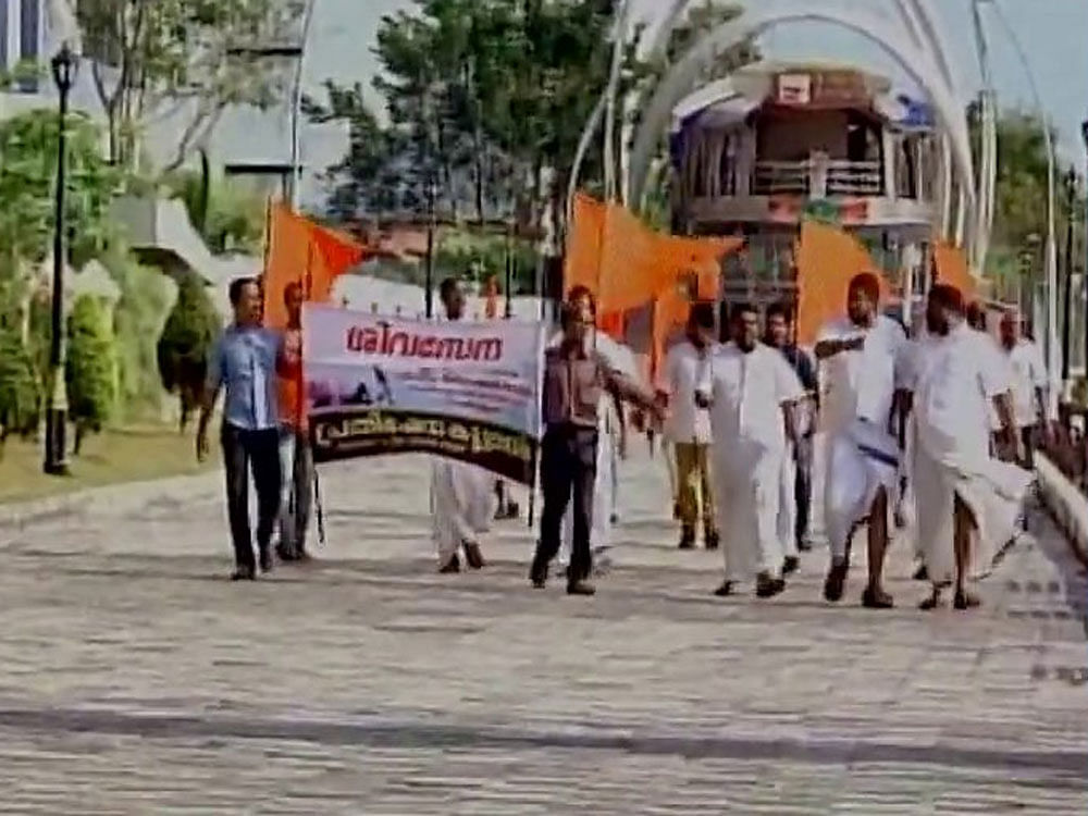 Six Shiv Sena activists have been arrested in connection with yesterday's incident. TV news channels had aired video footage of a group of Sena activists wielding sticks and chasing away young men and women from Marine Drive yesterday. Image: ANI