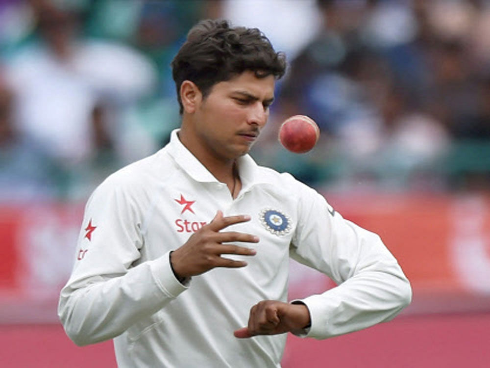 Kuldeep Yadav in action against Australia during the first day of last test match at HPCA Stadium in Dharamsala on Saturday. PTI Photo
