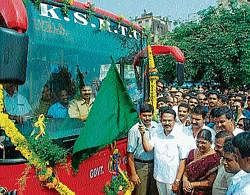 District-in-Charge Minister J Krishna Palemar flagging off the airconditioned KSRTC Volvo buses on Mangalore - Udupi - Manipal route at the State Bank private bus stand in Mangalore on Saturday. KPN