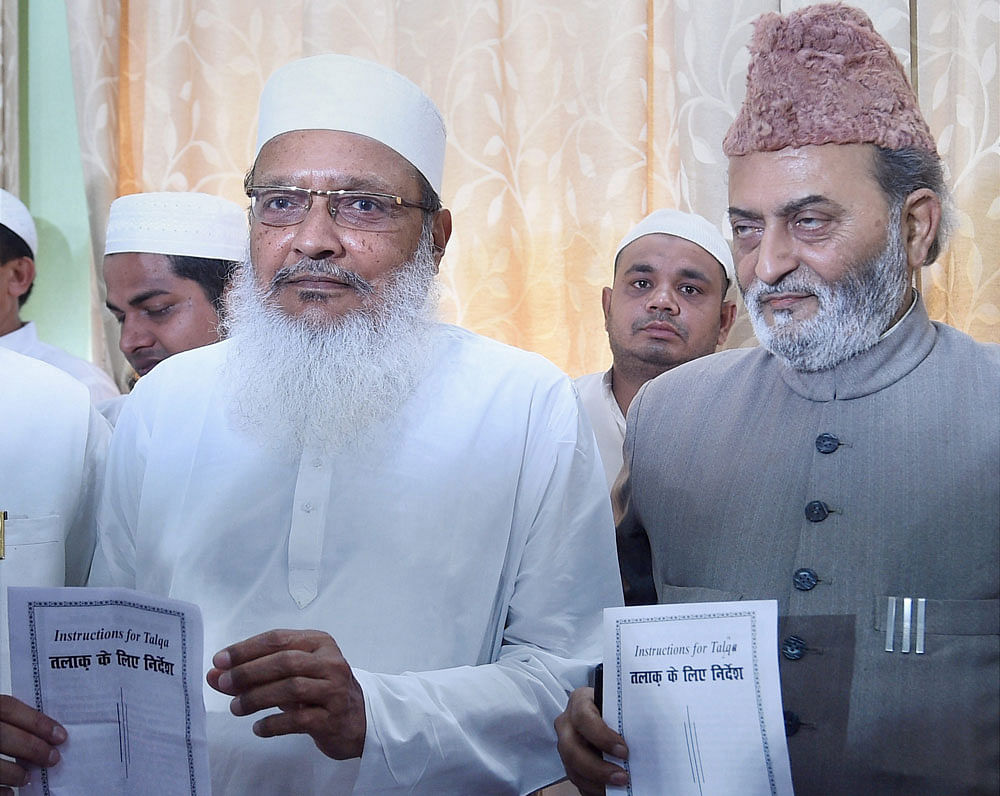 All India Muslim Personal Law Board (AIMPLB) general secretary Maulana Wali Rahmani and Executive Member Zafaryab Jilani at a press conference in Lucknow on Sunday. PTI Photo