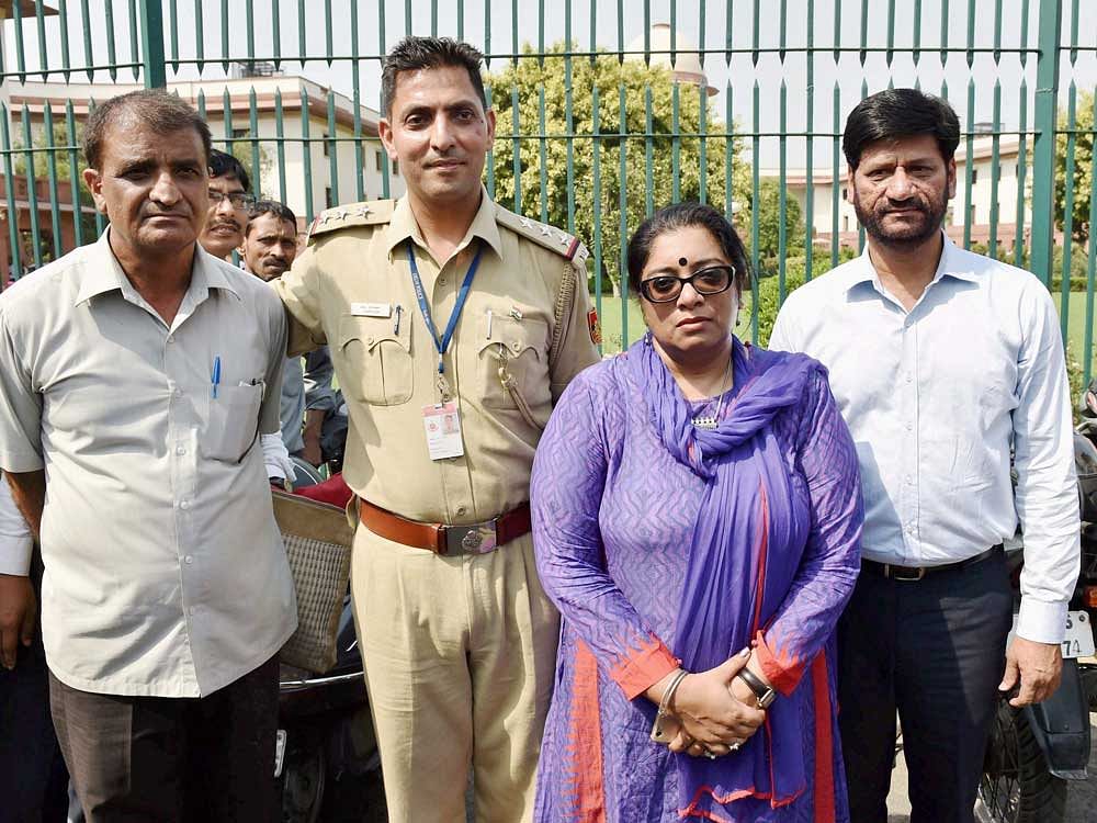 Nirbhaya gangrape case investigative officer Chaya Sharma with her team outside the Supreme Court which upheld the death sentence for the four convicts in the case in New Delhi on Friday. 23-year old Nirbhaya was gangraped and tortured on a moving bus on Dec 16, 2012. PTI Photo