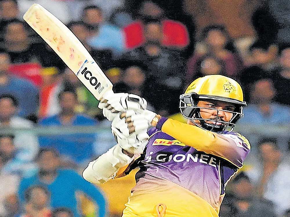 Kolkata Knight Riders' opener Sunil Narine sends one to the fence en route to his 17-ball 54 against RCB in Bengaluru on Sunday. DH PHOTO/KISHOR KUMAR BOLAR