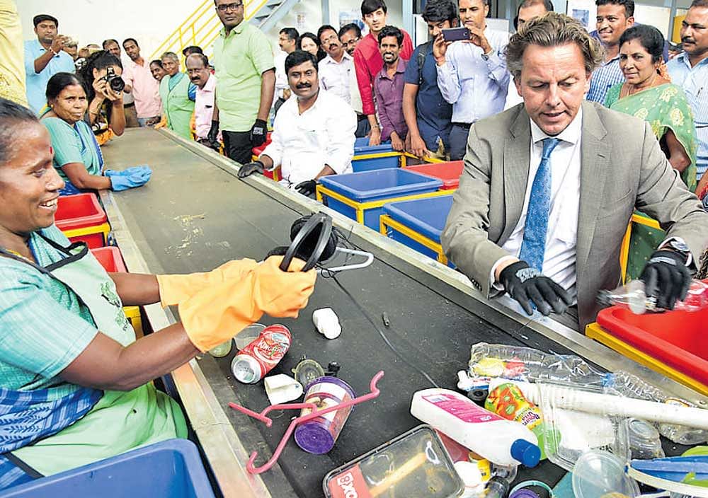 Bert Koenders, Minister of Foreign Affairs of the  Netherlands, during a visit to the dry waste collection  centre at Marappanapalya in Bengaluru on Monday.  DH Photo