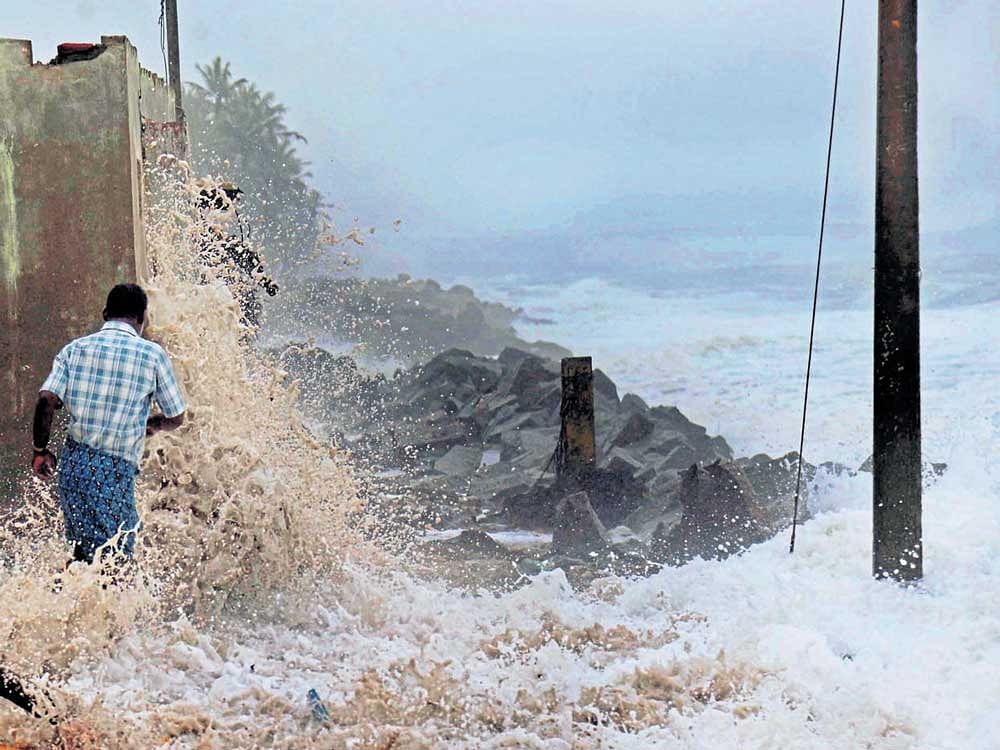in full gusto: Waves strike Valiyathura coast in Thiruvananthapuram on Wednesday. PTI