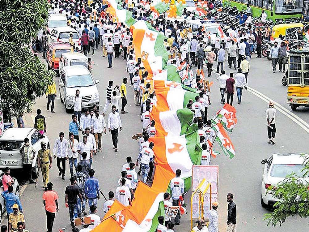 Youth Congress workers take out a rally ahead of the oath-taking ceremony of their new chief, triggering traffic jams in the city on Wednesday. DH Photo
