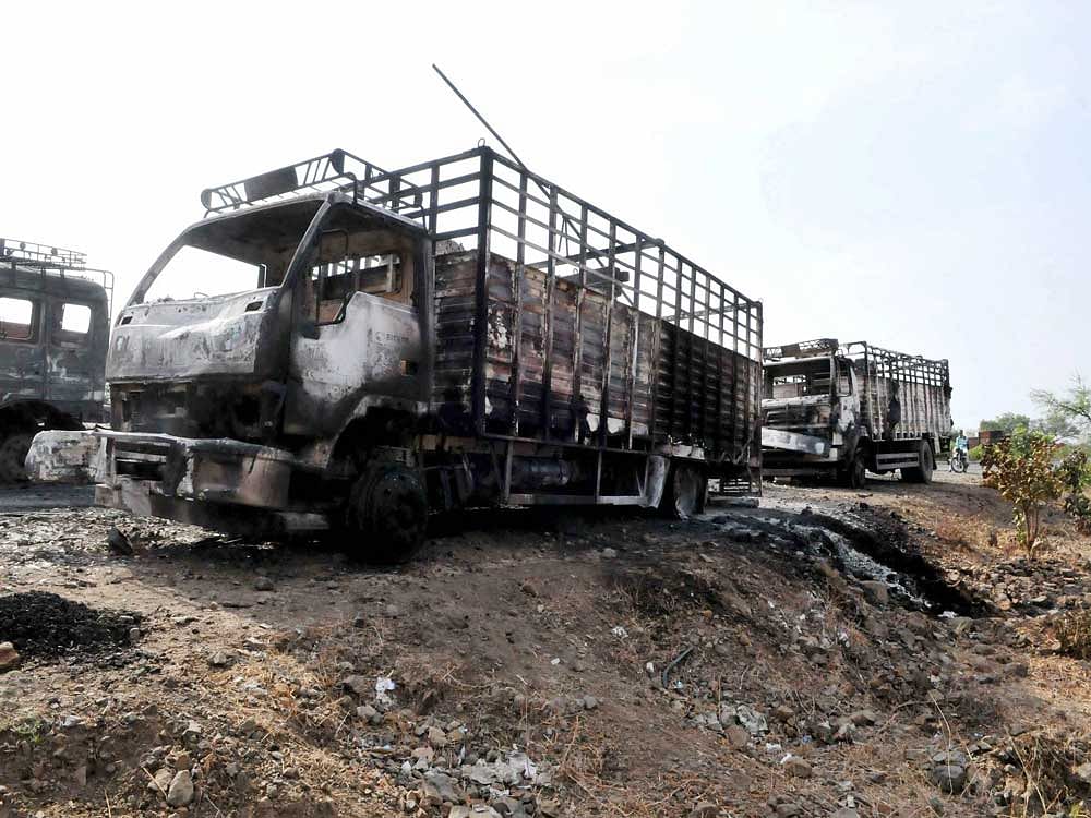 Mandsaur: Farmers' agitation turns violent as they torch trucks at Mhow-Neemuch Highway in Mandsaur district of Madhya Pradesh on Wednesday. PTI Photo