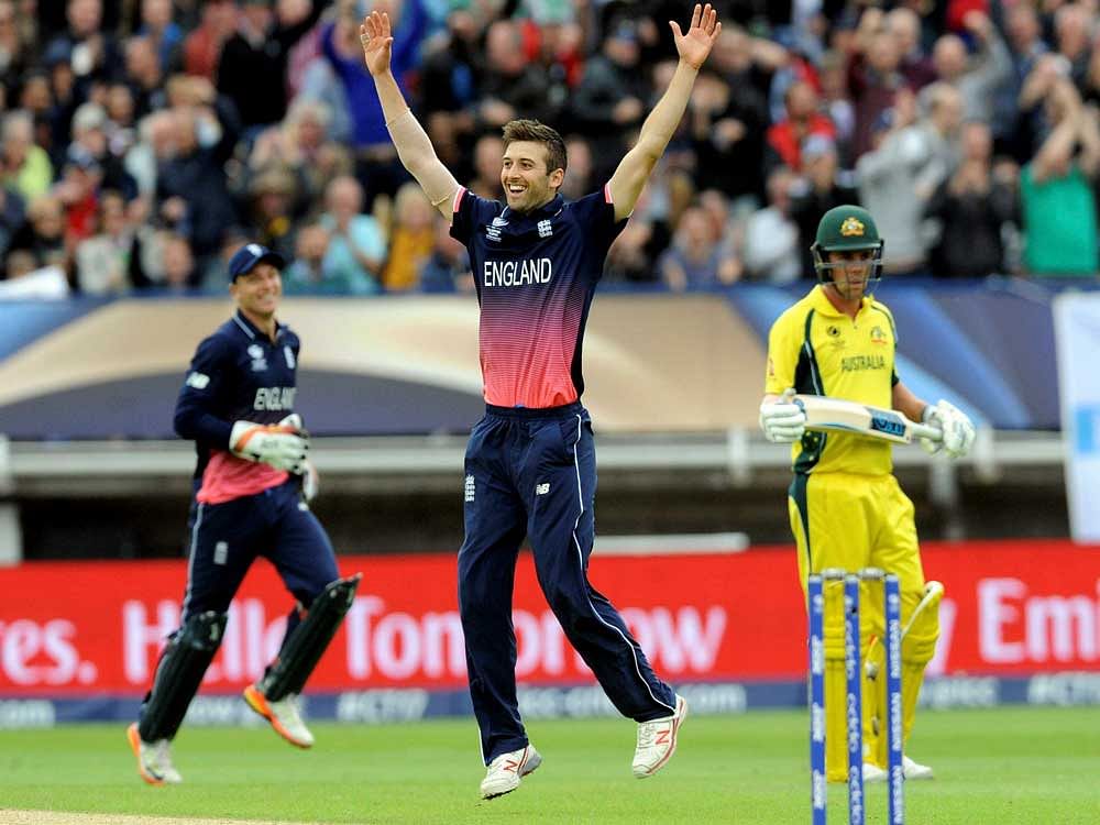 England's Mark Wood celebrates after bowling Australia's Glenn Maxwell caught by England's Jason Roy for 20 runs during an ICC Champions Trophy match between England and Australia at Edgbaston in Birmingham, England, Saturday, June 10, 2017. AP/PTI