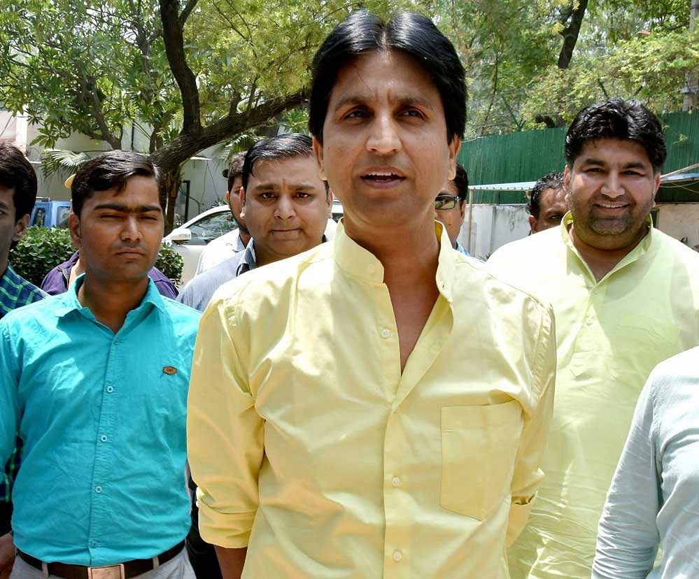 AAP leader Kumar Vishwas at the party office in New Delhi on Saturday. PTI Photo