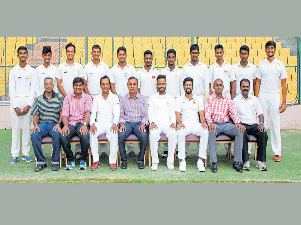 Champions: Jawahar Sports Club (1), winners of the KSCA Group I, Division II, tournament for MAT Acharya Shield on Tuesday. From left (standing): Manoj, Kishan S Bedare, Ashish Yadav, KS Devaiah, Abhishek Sharma, Rohith Sundar, SJ Nikin Jose, Shimon Luiz, K Shashindra, Jayesh Babu, Shreyas BM. Sitting: Sanjay Nair, Nisheet Doshi (manager), CB Karthik, Prashanth L (secretary), KC Avinash (captain), Raghavendra C, YB Basavaraj (coach), Raghavendra Rao.
