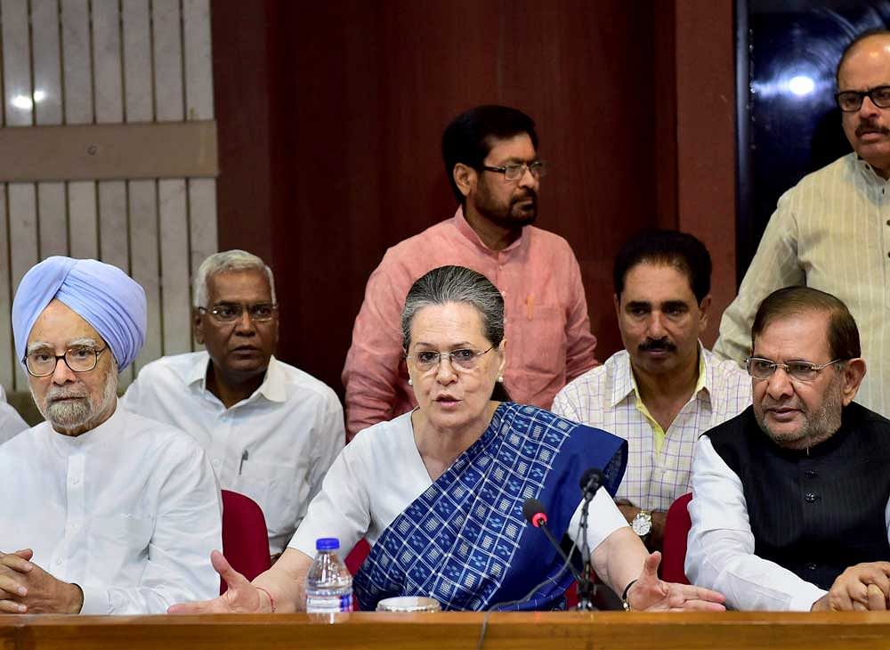 Former prime minister Manmohan Singh, Congress President Sonia Gandhi, JD(U) leader Sharad Yadav and others at a meeting to deliberate on the name of the joint candidate for the Vice President's election, in New Delhi on Tuesday. PTI Photo