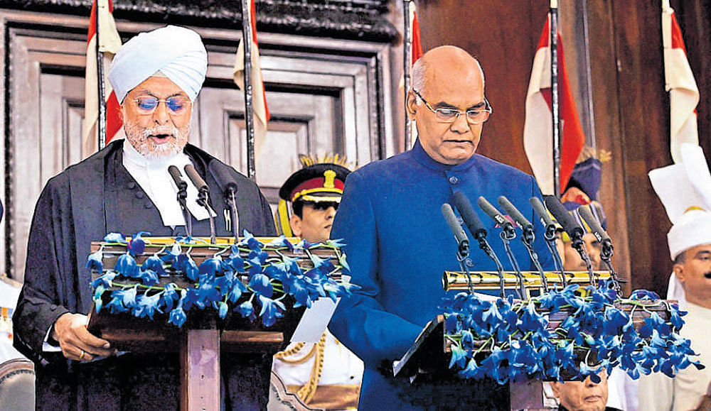 Chief Justice of India Justice J S Khehar administers the oath of office to Ram Nath Kovind, the 14th President of India, in the Central Hall of Parliament in New Delhi on Tuesday. PTI