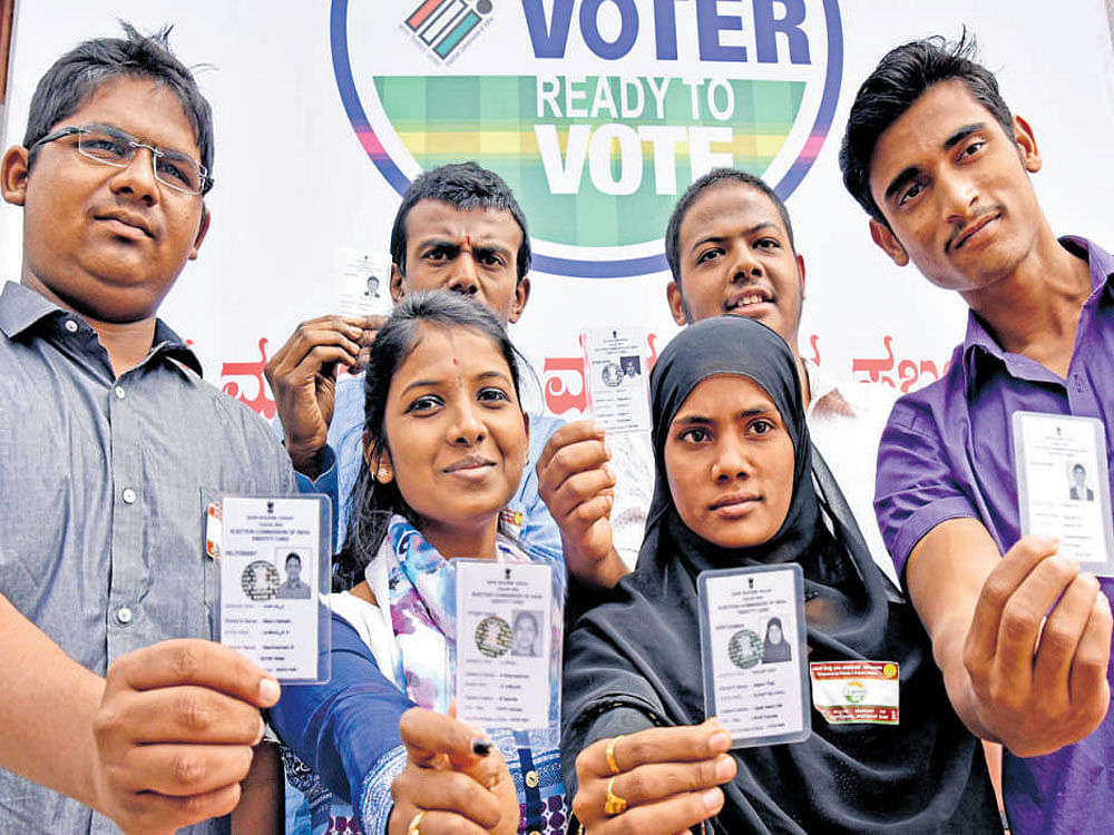 They informed the NRIs that an overseas Indian, at present, could cast his or her vote in the constituency he or she belonged to by being physically present at the polling station. The individual has to also show his or her original passport to poll officials. DH file image for representation