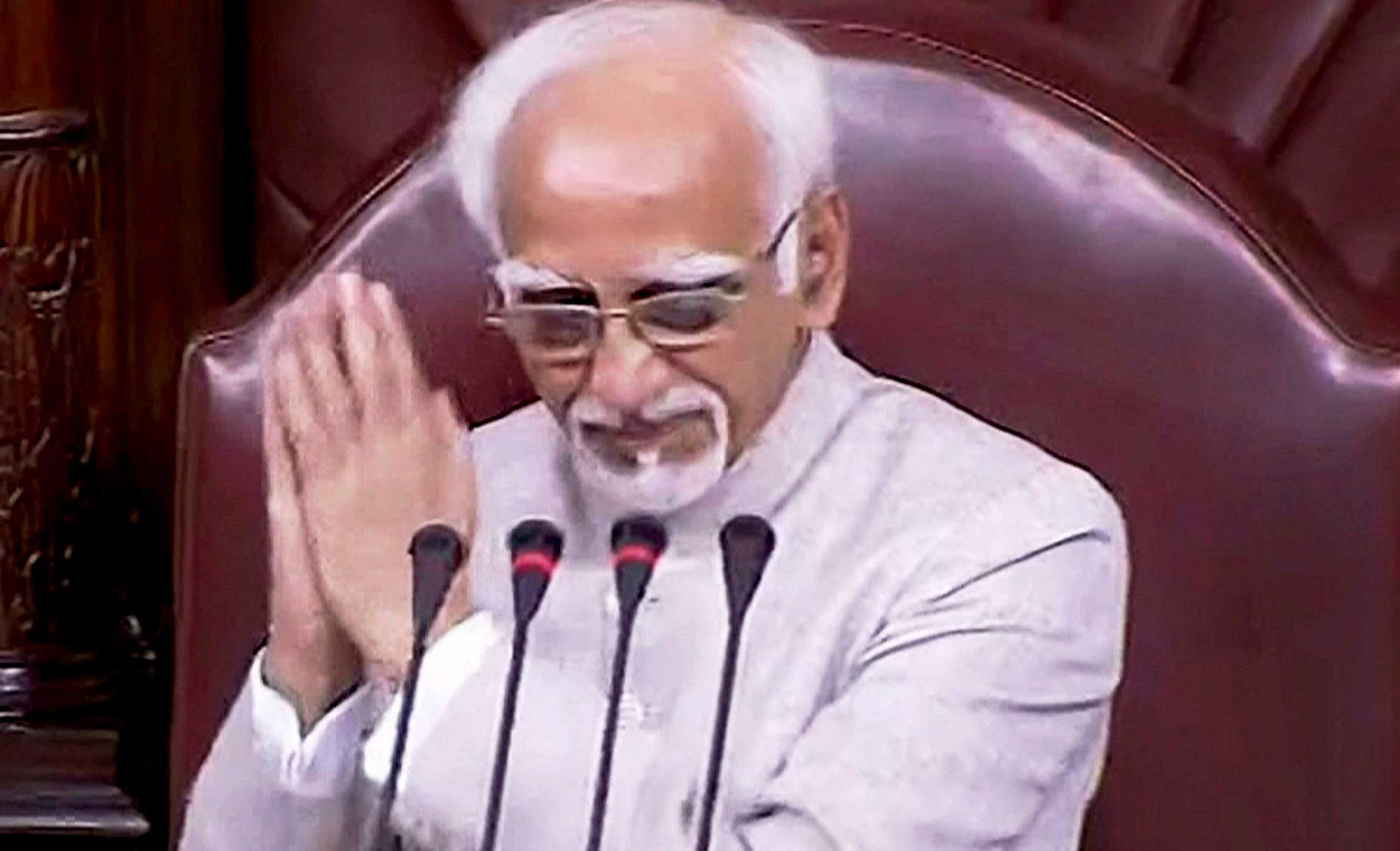 Vice President Hamid Ansari gestures while chairing his last session in the Rajya Sabha, in New Delhi on Thursday. Ansari, whose tenure as Vice-President comes to a close on Thursday, was given a farewell in the Rajya Sabha where he has served as Chairman for the last decade. PTI Photo