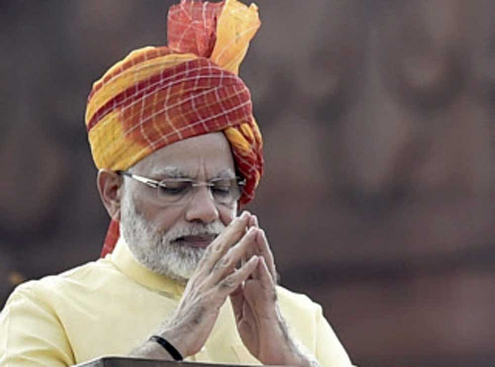 Prime Minister Narendra Modi gestures while addressing the nation during the 71st Independence Day function at the historic Red Fort in New Delhi on Tuesday. PTI Photo