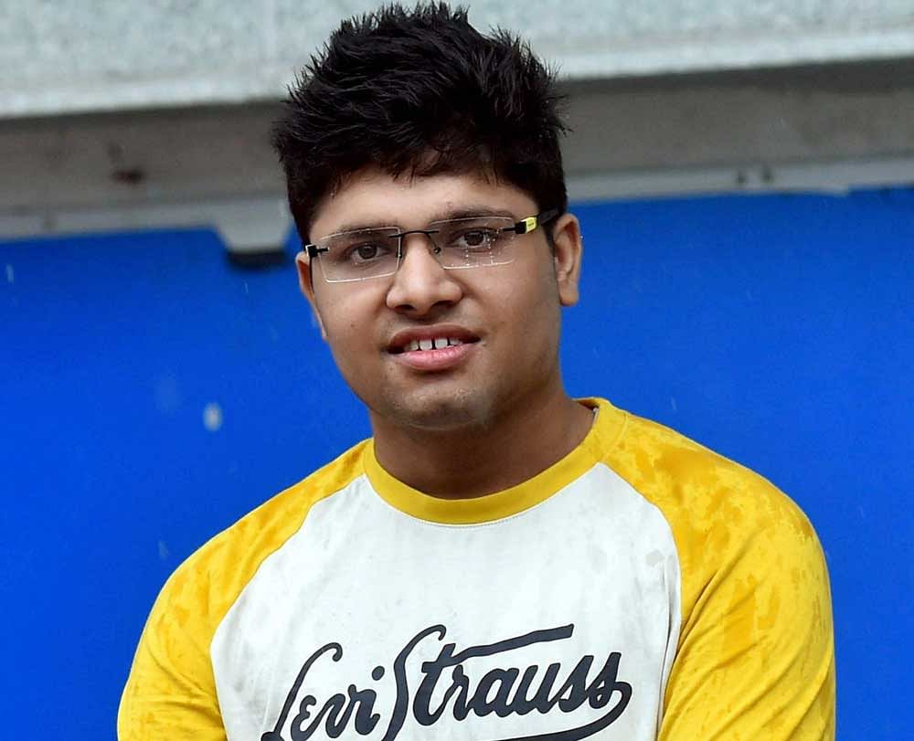 Kalpit Veerwal, who has made it to the Limca Book of Records for being the first-ever student to have scored 100 pc in the Joint Entrance Examination Mains, posing for a photograph in Mumbai. PTI photo.