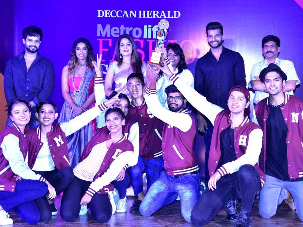 Students of St Joseph's College got second place in seventh edition of inter Collegiate Metrolife Fashion Show 'North Zone' organised by Deccan Herald at CMR Law School in Bengaluru on Saturday, 19 August 2017. Suraj Gowda, Actor, Krishi Thapanda, Actor, Meghana Raj, Actor, Runa Ray, Designer, Rahul Rajashekaran, Model, C M Baskar Reddy, Director CMR Group of Institutions, Suja Bennet, Principal CMR IMS are seen. Photo by S K Dinesh