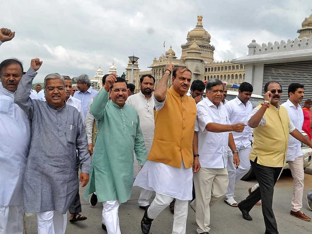 Earlier, the BJP leaders led by Union Minister for Parliamentary Affairs Ananth Kumar took out a protest march from Ambedkar statue in front of the Vidhana Soudha to the Raj Bhavan. DH Photo