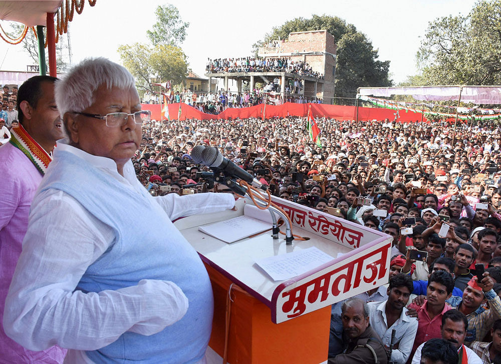 Meanwhile Lalu, flanked by Tejashwi and senior party leader Jagdanand Singh, alleged 'the prime minister's visit on August 26 is aimed at foiling the RJD rally the next day'. In picture: Lalu Prasad. Photo credit: PTI. Representational Image.
