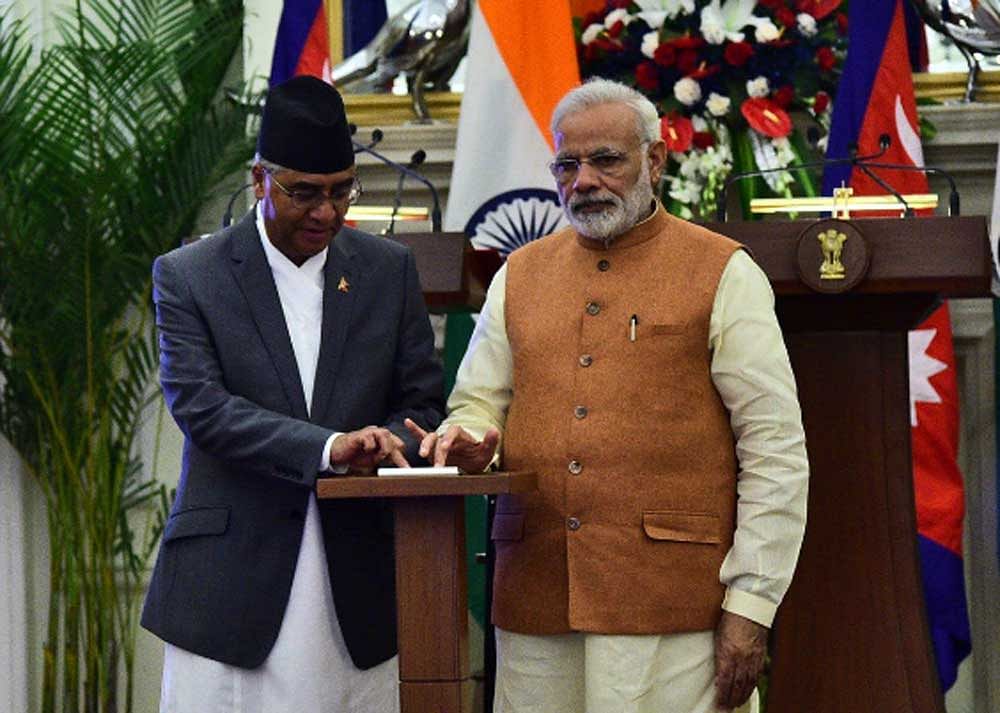 PM Modi and Nepal PM, Sher Bahadur Deuba jointly inaugurate the Kataiya-Kusaha & Raxaul-Parwanipur cross border Transmission lines. Photo credit: PIB/twitter