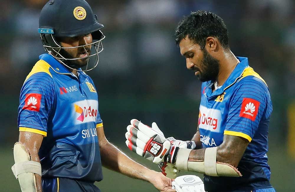 Chamara Kapugedera (R) is Lanka's eighth change in captaincy in less than three months across all formats. Reuters photo.