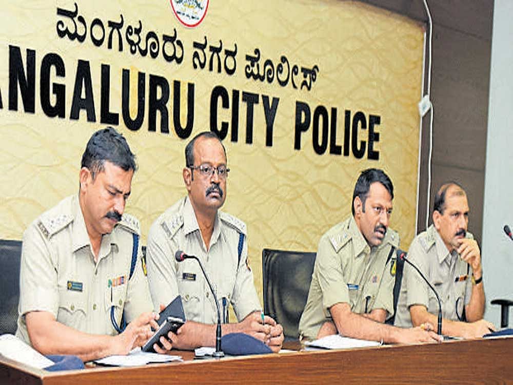 DCP (Law and Order) Hanumantharaya speaks at monthly SC/ST grievances meeting in Mangaluru on Sunday.