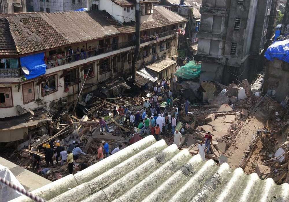 Rescue works underway at the site of building crash near the Sir JJ Hospital in Mumbai. DH photo